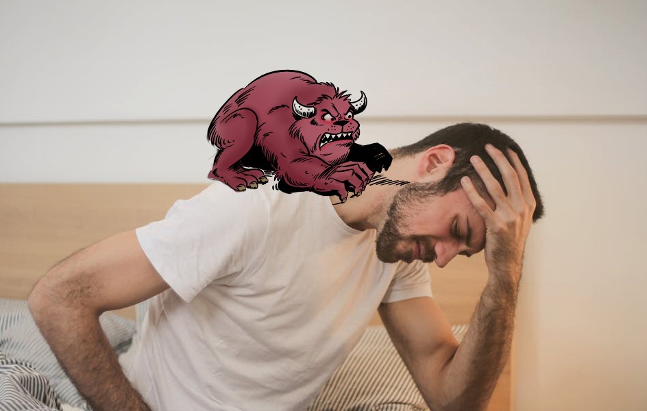 Oseba na sliki ima močne glavobole, ki so posledica stresa.